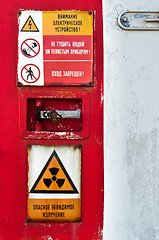 Image showing Closed door of a nuclear facility with signs