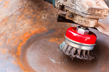 Image showing wire brush for cleaning rust off metal surface