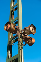 Image showing Rusty old, but working speakers at a hungarian train station