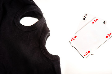 Image showing A pair of aces with a mask of a burglar