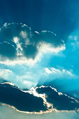 Image showing Sun striking trough clouds