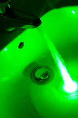 Image showing Green glowing water flow