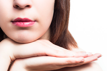 Image showing Lips of a girl with her hands