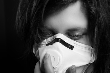 Image showing Closeup of a girl with protective mask