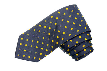 Image showing Yellow diamond pattern shappes blue tie