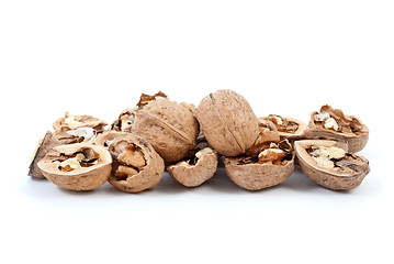 Image showing Cracked and whole walnuts