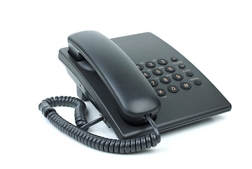 Image showing Black office phone with handset on-hook