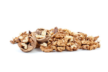 Image showing Cracked walnuts and kernels