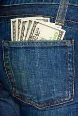 Image showing Jeans pocket with $100 bills