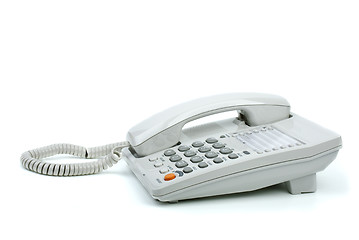 Image showing White office phone with handset on-hook