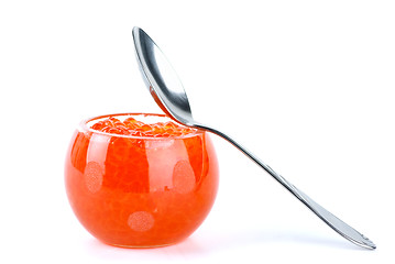 Image showing Glass bowl filled with red salmon caviar and small  spoon