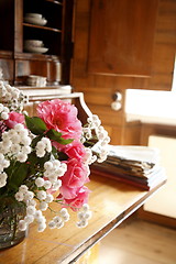 Image showing Flowers on desk