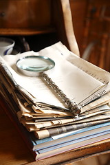 Image showing Magnifying Glass on papers