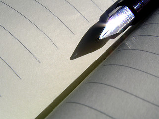 Image showing Note book and pen