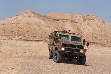 Image showing Israeli army Humvee on patrol in the Judean desert 