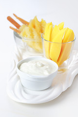 Image showing Fresh mango and pineapple and curd cheese