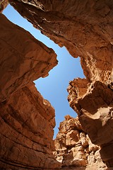 Image showing Narrow slot between two rocks in desert canyon