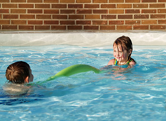 Image showing children playing in swimming pool