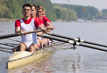 Image showing Rowing team during the start