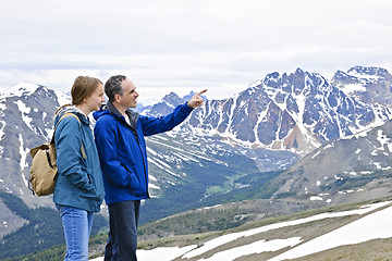 Image showing Father and daughter in mountains