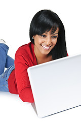 Image showing Young woman using laptop computer