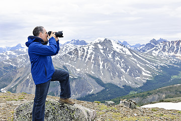 Image showing Photographer in mountains