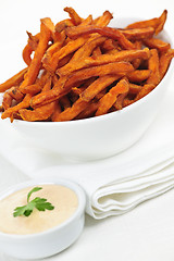 Image showing Sweet potato fries with sauce