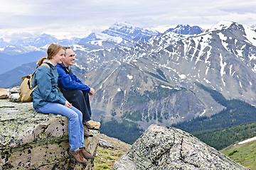 Image showing Father and daughter in mountains