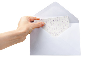 Image showing female hand holding an envelope