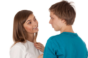 Image showing pair of teenagers looking at each other