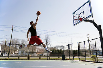 Image showing Man Dunking the Basketball