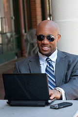 Image showing Business Man Working Wirelessly and Mobile