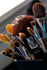 Image showing Wedding Rings On Makeup Brushes