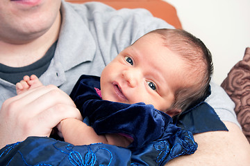 Image showing Happy Father Holding His Newborn Baby