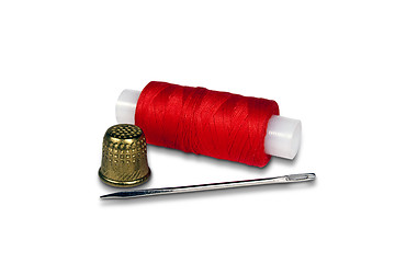 Image showing Spool of thread. Needle. Thimble