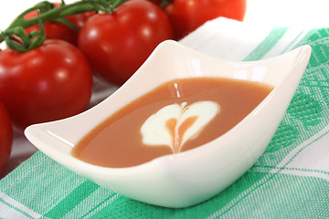 Image showing tomato soup with dollop of cream