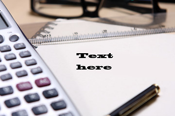 Image showing pen ,book, ruler, calculator and glasses