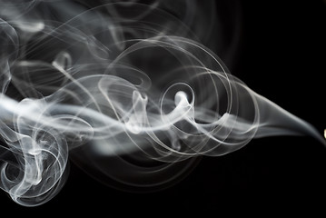 Image showing Abstract black smoke swirls on black