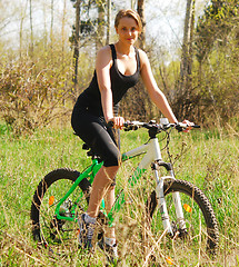 Image showing biking woman