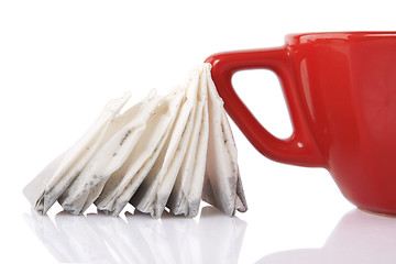 Image showing Red Ceramic cup with tea bags 