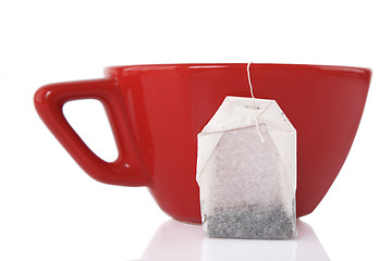 Image showing Red Ceramic cup with tea bag 