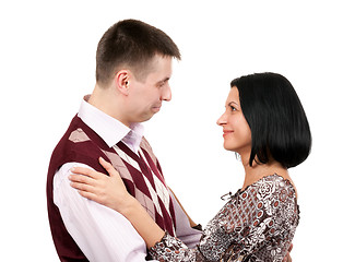 Image showing Man hugs and loving looks at the girl
