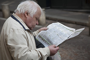 Image showing Man reading his newspaper