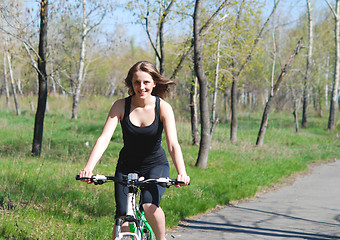 Image showing biking woman