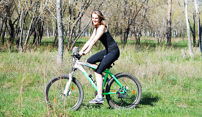 Image showing biking woman