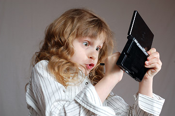 Image showing child playing video game 