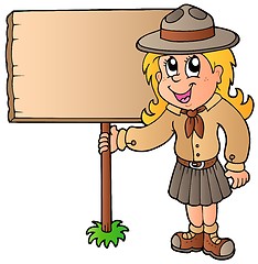 Image showing Scout girl holding wooden board