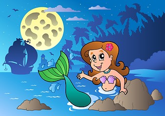 Image showing Night seascape with swimming mermaid