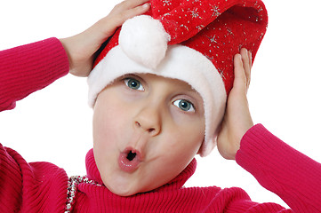 Image showing cute surprised Santa girl