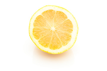 Image showing Single cross section of lemon. Isolated. Close-up.